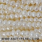 3809 freshwater flat potato pearl strand 2.5-3mm.jpg